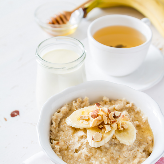 Banana and Grey Box Honey Porridge topped with almonds